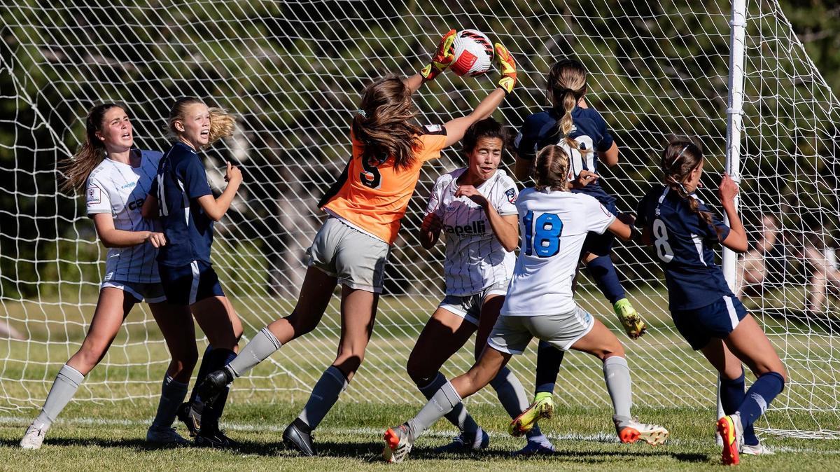 Goalie Marin MacKenzie of Idaho Rush makes a save during their game against Wasatch SC (Utah) in the U-15 girls final of the U.S. Youth Soccer Far West Regional Championships at Simplot Sports Complex in Boise on Sunday.