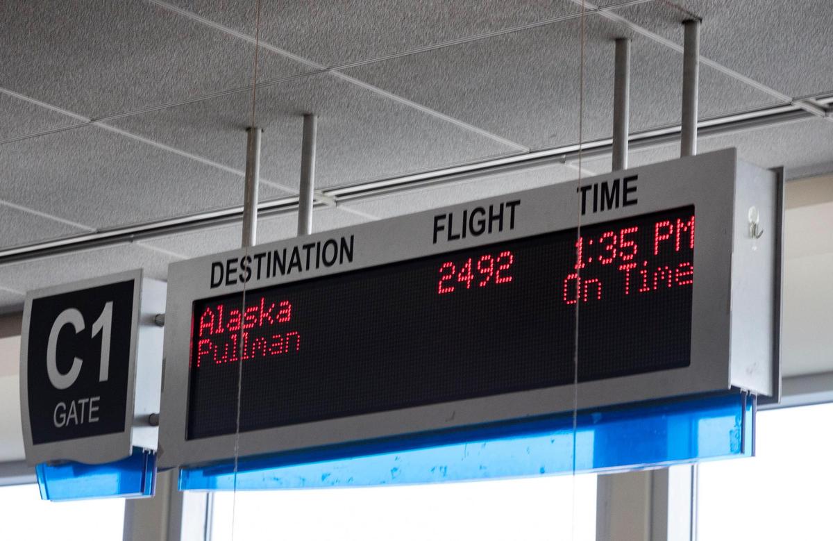 A sign indicates the status of the intrastate flight to Pullman at the Boise Airport on Wednesday, Jan. 5, 2022. The Boise Airport has a list of five destinations it is prioritizing for future routes, including Orlando, Honolulu, New York City-area airports, Boston and Anchorage, plus Idaho intrastate airports.