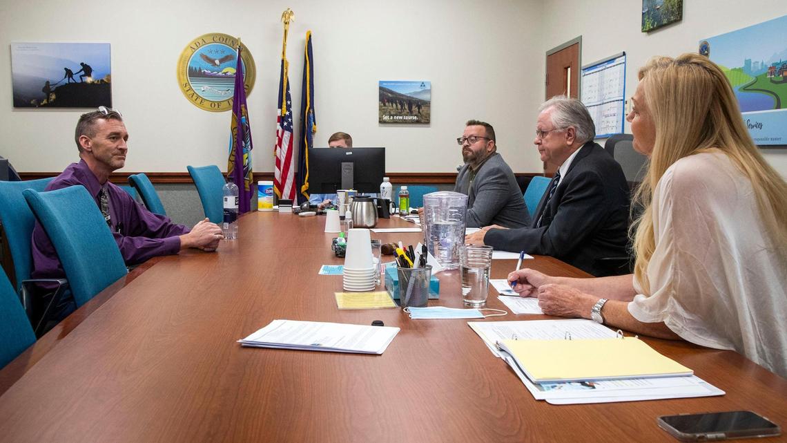 The Ada County Commission interviews candidate Dr. Ryan Cole, a pathologist, to fill a position on Central District Health Board of Health, Monday, Aug. 9, 2021 at the Ada County Courthouse in Boise. Dr. Stan Moss, a retired orthopedic surgeon, and Dr. Sky Blue, an infectious disease specialist with background epidemiology, preceded Dr. Cole in front of the commission.