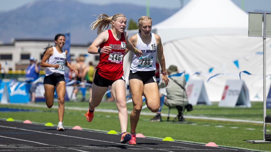 Boise’s Sammy Smith edges out Rocky Mountain’s Brighton Heywood for first place in the 5A girls 800 meters.