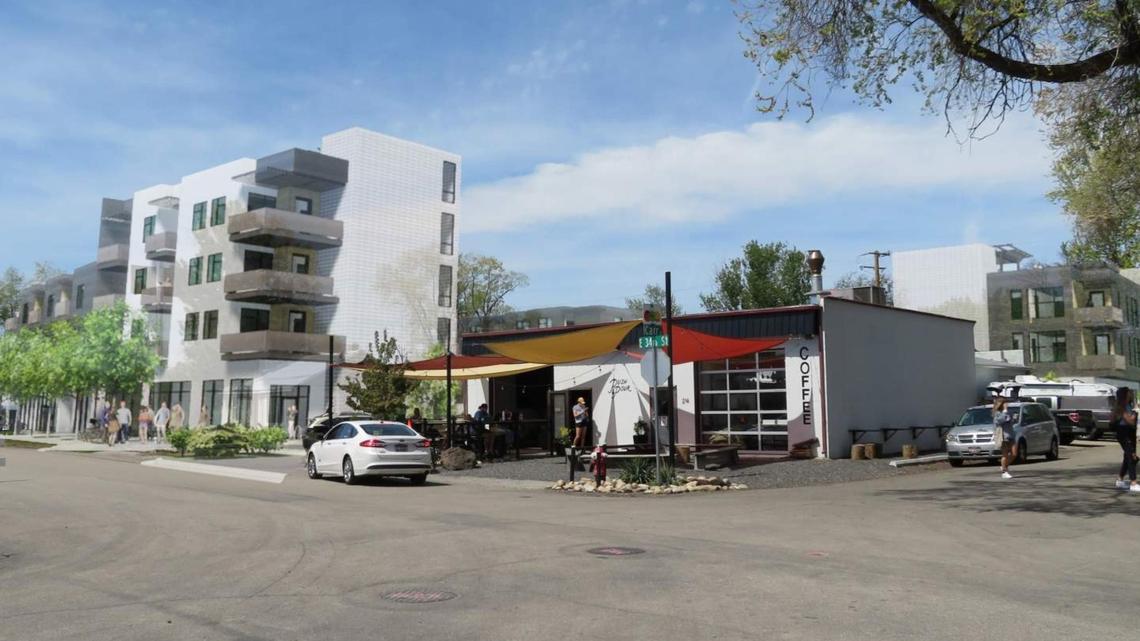 Two of the buildings can be seen to the left and the right of Push & Pour, in center in this west-facing image. The top of the third building can just barely be seen above Push & Pour’s brown awning.