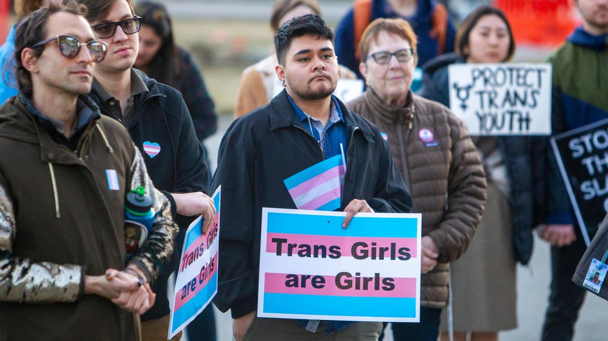 More than 100 people rallied on March 3, 2020, at the Idaho Capitol in support of transgender students and athletes during the 2020 legislative session. The Idaho House on Tuesday passed a bill that would criminalize providing gender-affirming medical care for trans minors.