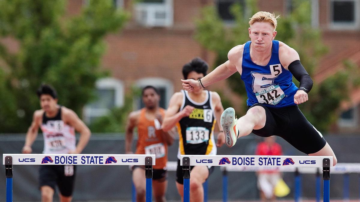 Emmett’s Landon Helms won four state titles at the 4A track and field meet in the spring, including the 300-meter hurdles, above.