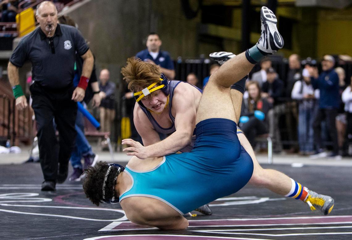 Meridian’s Kaleb Smith, back, is one of the reasons the Warriors are favored to win the 5A team title.