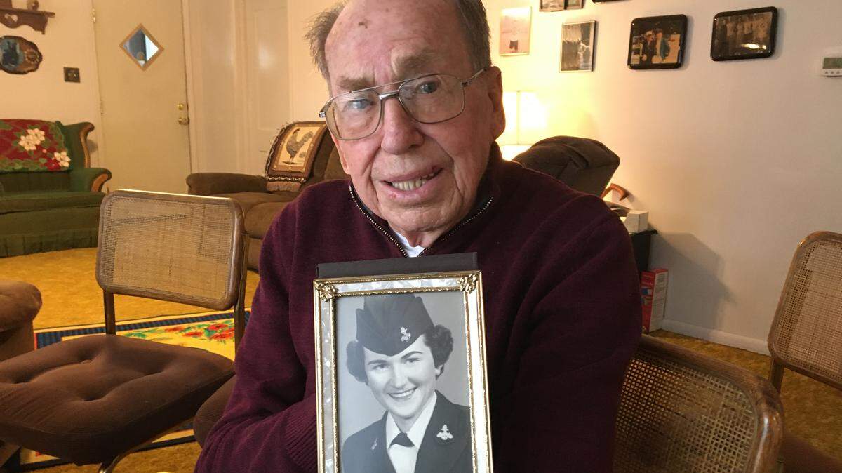 Bernie Pollard, of Parma, holds a photo of his late wife, Wanda, from her days in the U.S. Navy in the 1950s. Wanda Pollard’s image will be on a commemorative silver medallion being issued by the Idaho State Treasurer’s Office.