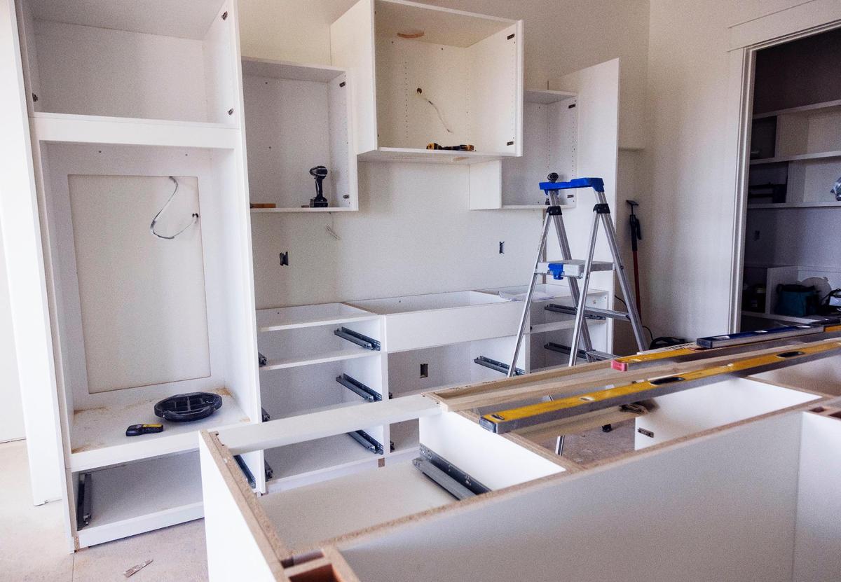 Workers were installing fixtures in the house on Sept. 27.