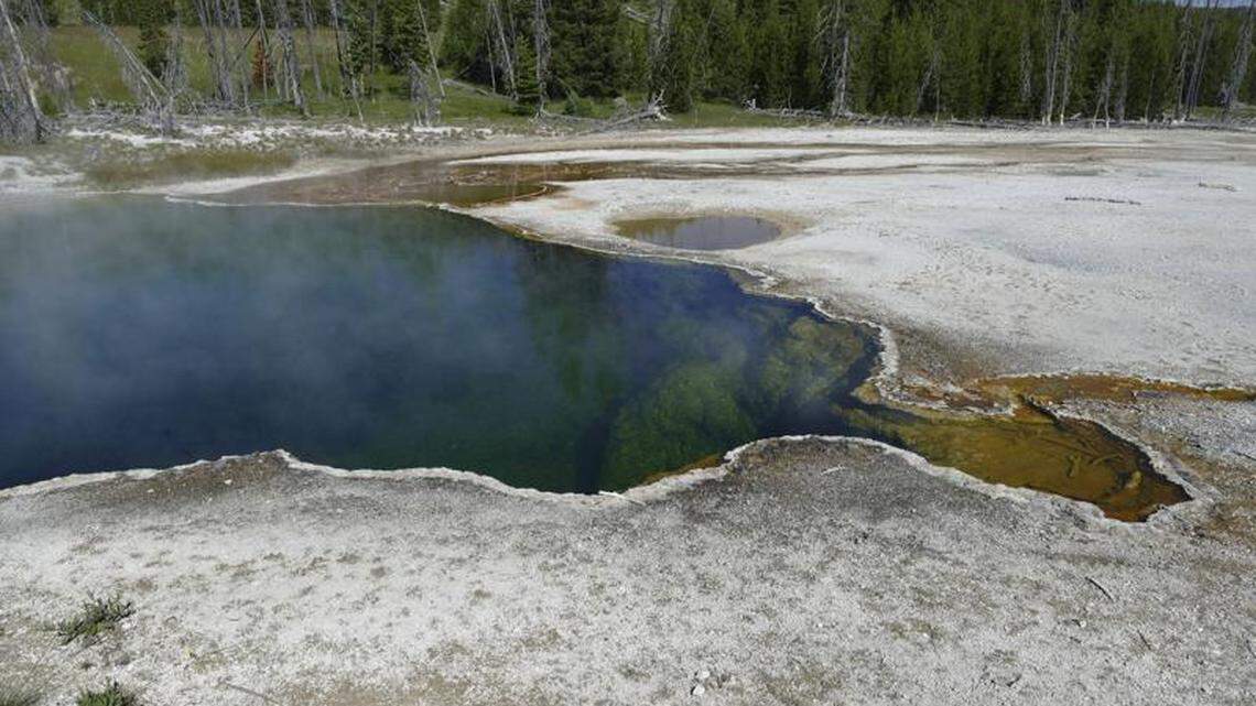 In this photo provided by the National Park Service, the Abyss Pool hot spring in the southern part of Yellowstone National Park is seen.