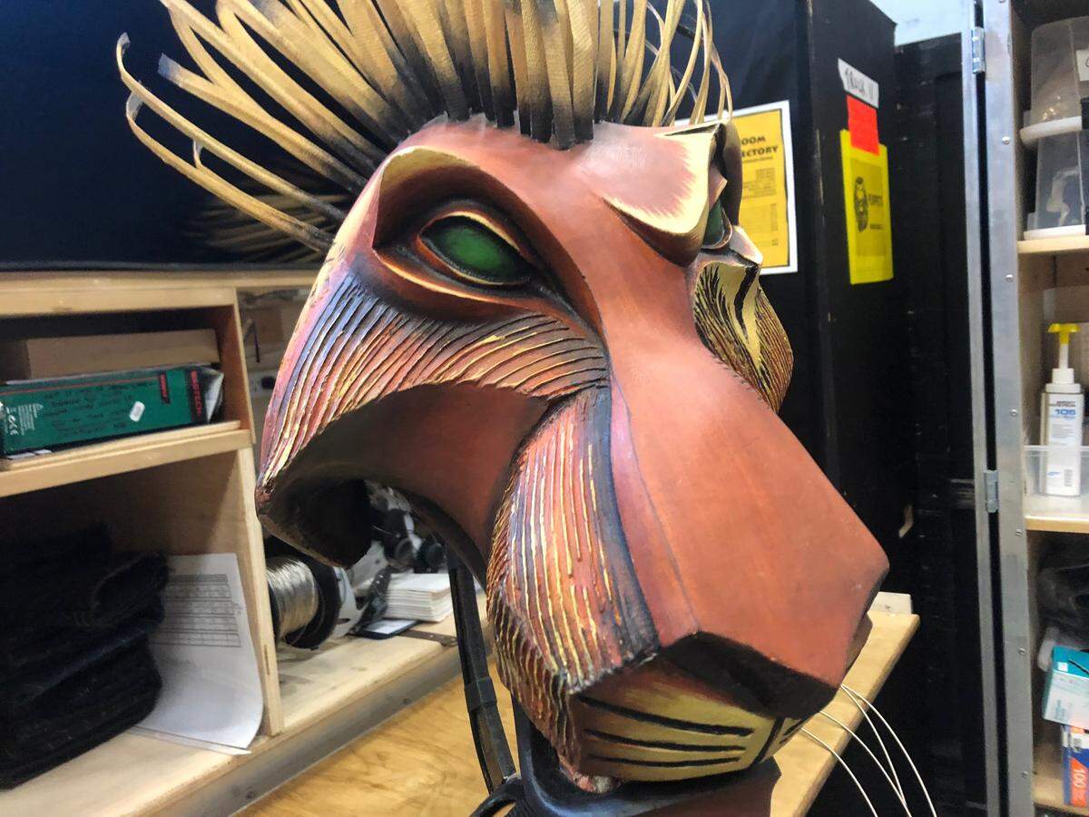 Mark Campbell’s Scar mask he wears in “The Lion King” features glowing green eyes. Under the stage lighting and with the actor’s movements, often people think they see the eyes move.