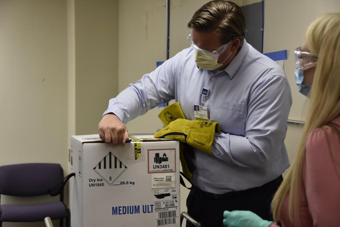 St. Luke’s in Boise received its first shipment of Pfizer’s COVID-19 vaccine. Scott Milner, St. Luke’s senior director of pharmacy, opens special box that keeps the vaccine at the proper sub-zero temperature. Each box weighs 70 pounds, 50 pounds of which is dry ice.