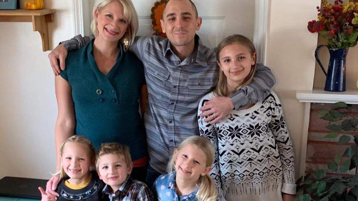 Joseph “Joe” Johnson, his wife Bree and their four children.