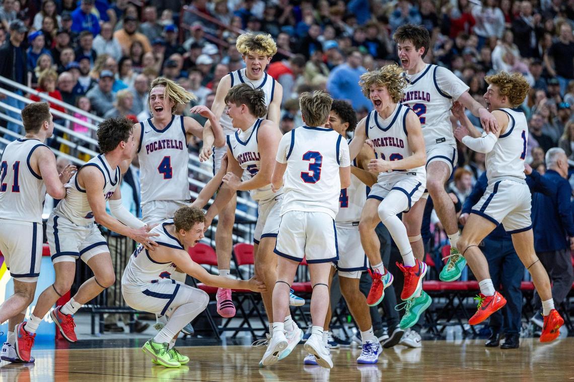 Pocatello celebrates at the buzzer after defeating Hillcrest 73-67 in the 4A boys basketball state championship game, Saturday at the Ford Idaho Center in Nampa.