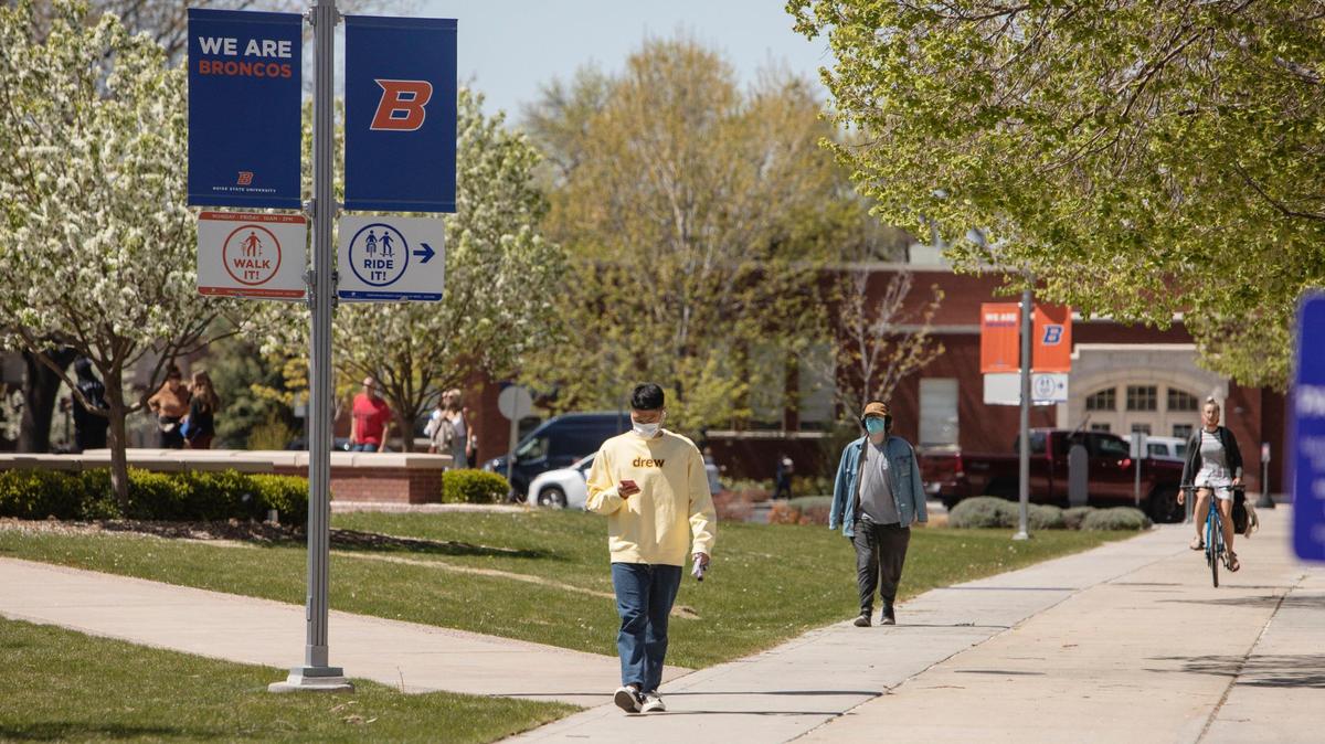 Students walk between buildings on campus at Boise State University on Thursday, April 22, 2021. Students, faculty and visitors can no longer access TikTok through campus networks, per an executive order by Idaho Gov. Brad Little.