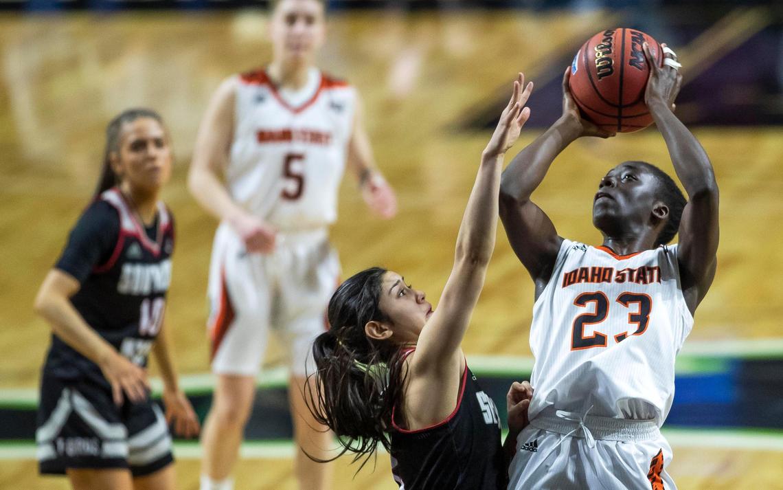 Idaho State guard Diaba Konate pulls up in the paint to score over Southern Utah’s Rebecca Cardenas in the Big Sky women’s basketball tournament Tuesday at CenturyLink Arena in downtown Boise.