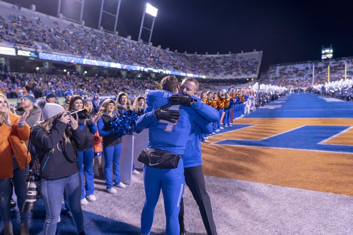 Boise State quarterback Brett Rypien gets a hug from head coach Bryan Harsin as he enters the stadium during Senior Night before the game at Albertsons Stadium. Boise State defeated Utah State 33-24. Saturday November, 24, 2018.
