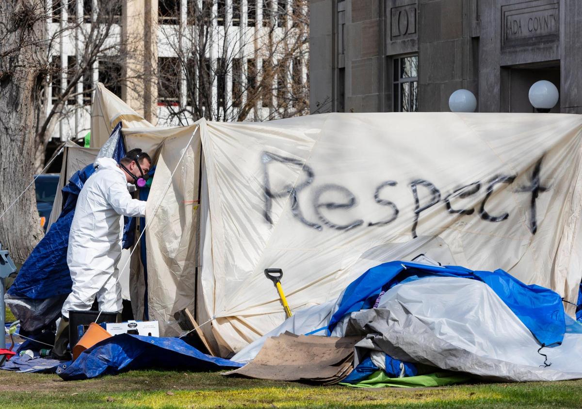 Idaho State Police and the Department of Administration were on the scene with a private company that hauled away a truck of what they called hazardous waste, including some tents and personal belongings of homeless protesters in downtown Boise.