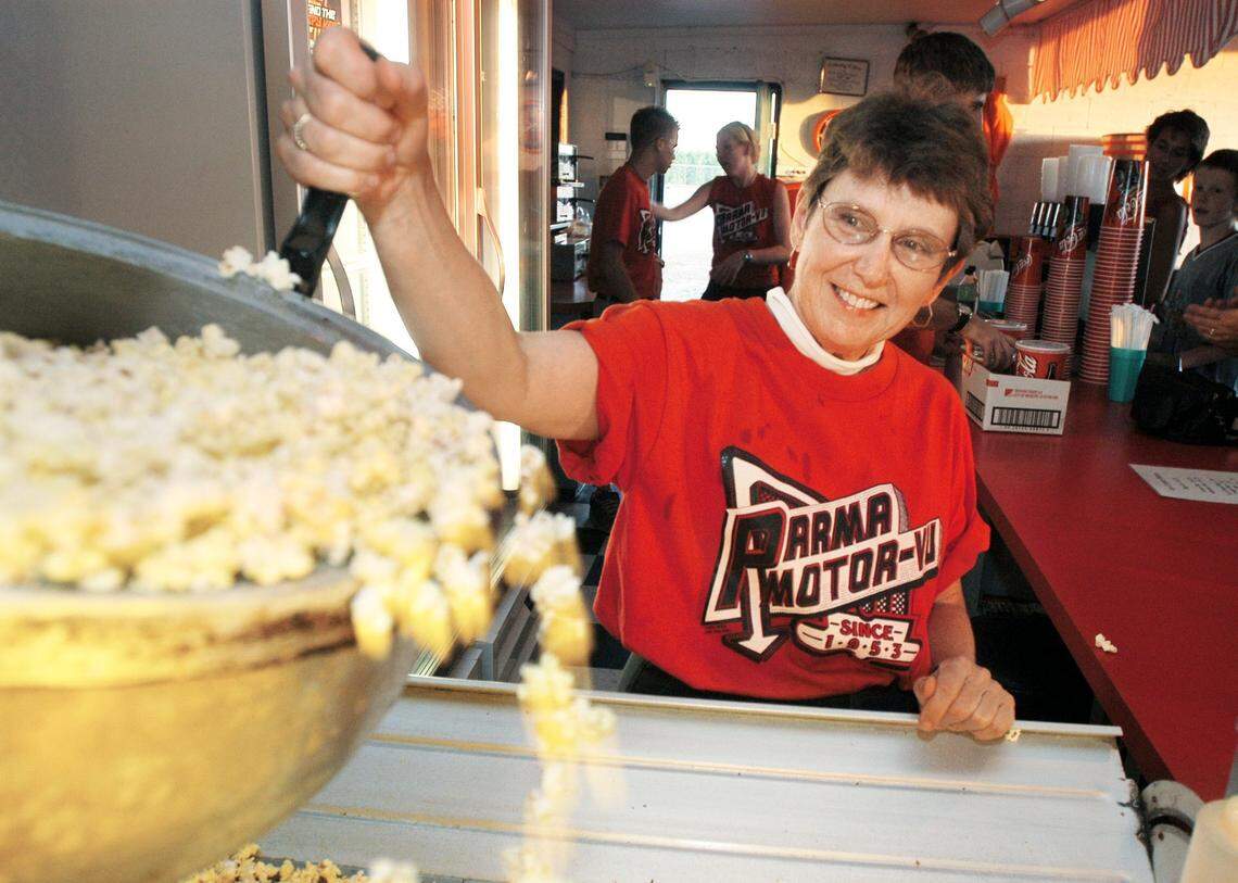 In this 2003 file photo, Karen Cornwell, then-owner of Parma Motor-Vu drive-in theater, makes popcorn at the snack bar. Cornwell´s father, Bill Dobbs, opened the theater in June 1953.