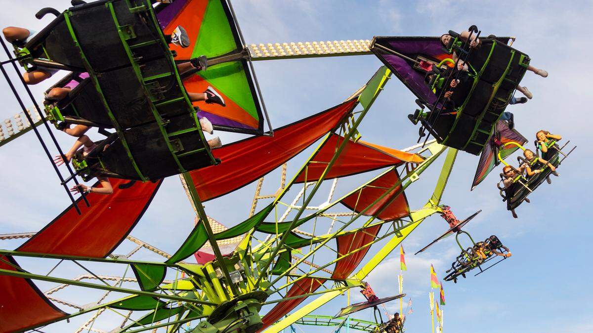 Fairgoers ride the rides at the Western Idaho Fair in Garden City on Aug. 24, 2022. Two people were injured after an argument at the fair Friday night. 
