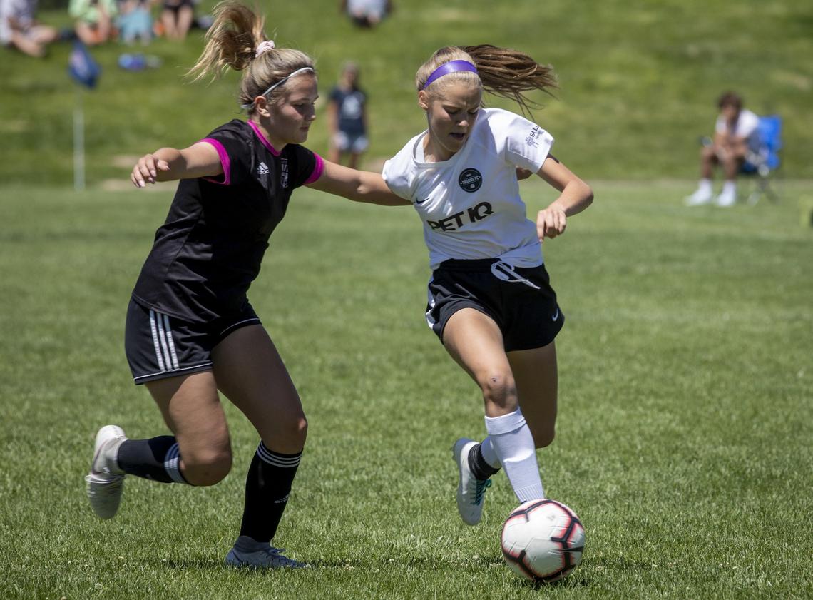 Kyndra Lyons of the U-15 Boise Thorns girls soccer team dribbles past the Billings United defense Wednesday at the Far West Regional Championships.