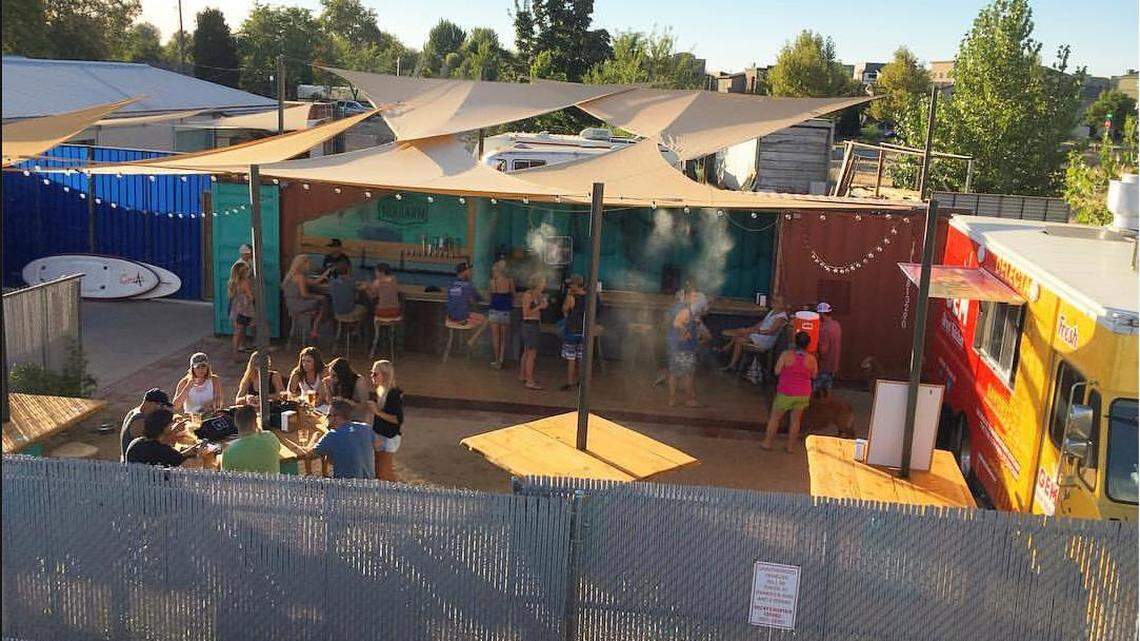 This photo from a few years ago shows converted shipping-container bar The Yardarm, which opens seasonally next to Corridor Paddle Surf Shop. Corridor owner Victor Myers co-owns The Yardarm with Guy Midnight.