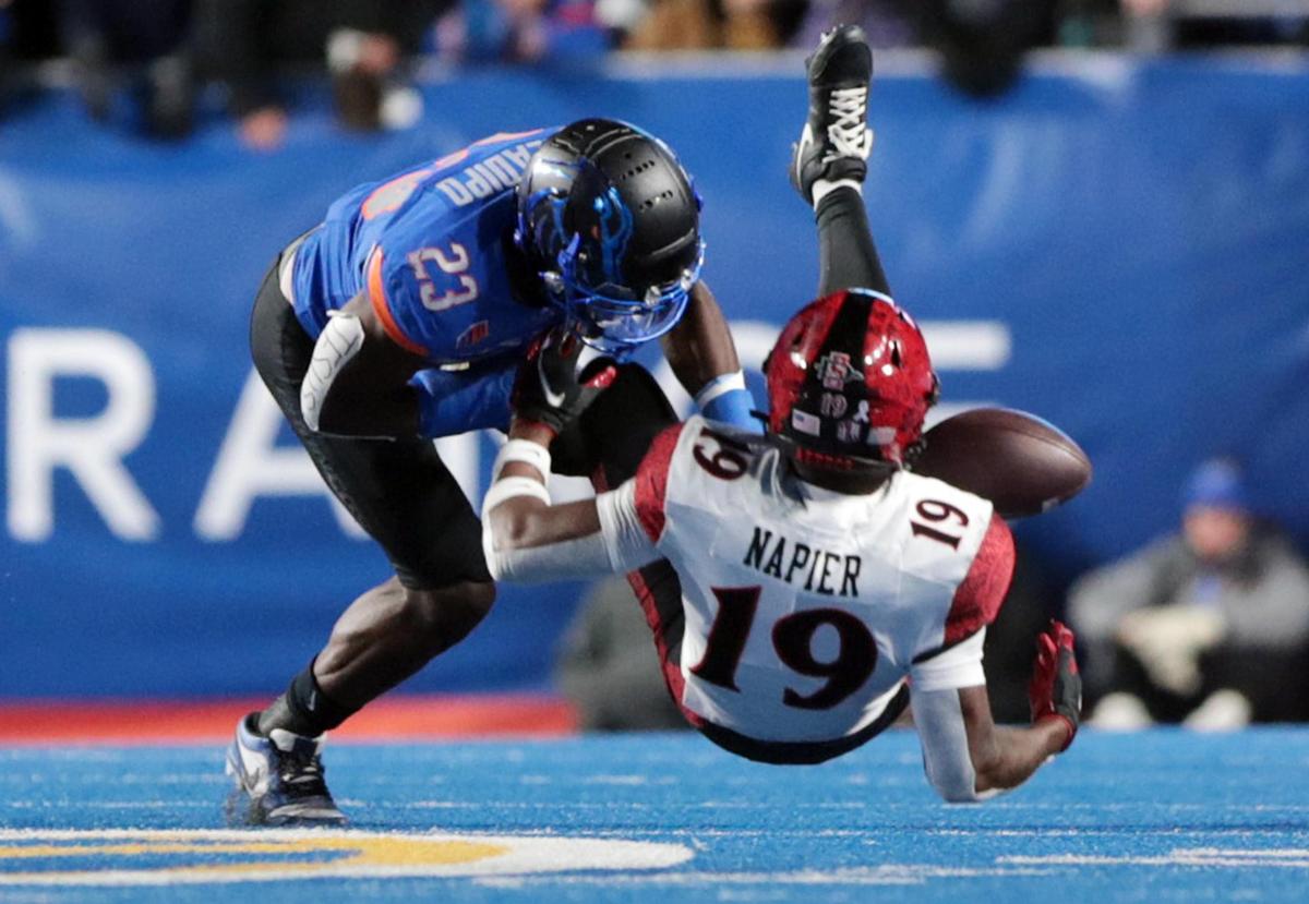 Boise State safety Seyi Oladipo forces a dropped ball from San Diego State wide receiver Jordan Napier. Boise State defeated San Diego State 56-24 at Albertson’s Stadium in Boise, Idaho.