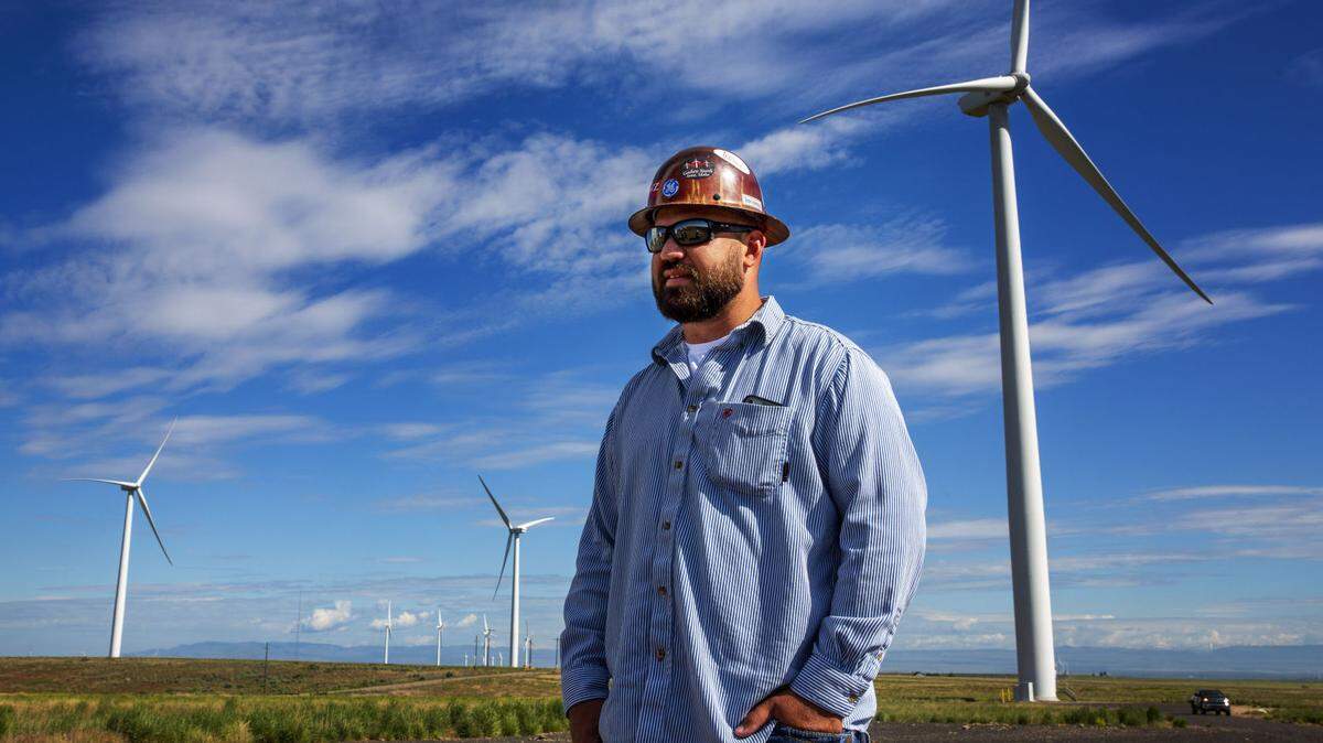 Facility Manager Keith Johnston talks about wind turbine energy May 24 at Idaho Wind Partners' Yahoo Creek project south of Hagerman. The company owns 11 wind projects in Twin Falls, Elmore and Cassia counties.