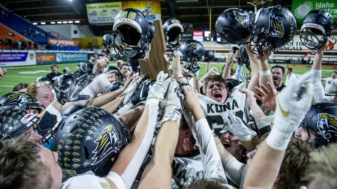 Kuna celebrates a perfect season and a 4A state championship in 2019 at Pocatello’s Holt Arena. The Kavemen’s football team was allowed to play in the 4A classification then with 5A-level enrollment as part of the state’s “competitive equity” push. That would not happen under a new rule passed by the IHSAA, which requires each sport to prove it should play at a lower level.