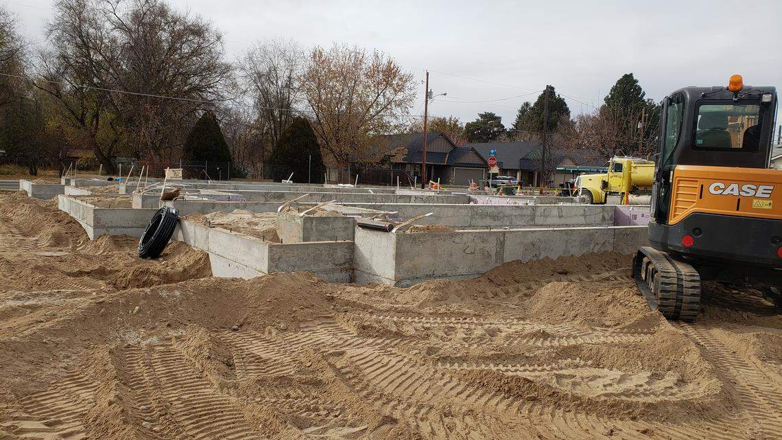 The foundations on the first of 20 homes getting built in the Flourish pocket neighborhood are going up at 45th and Adams streets in Garden City. The homes are being situated to encourage neighbors to meet each other and socialize.