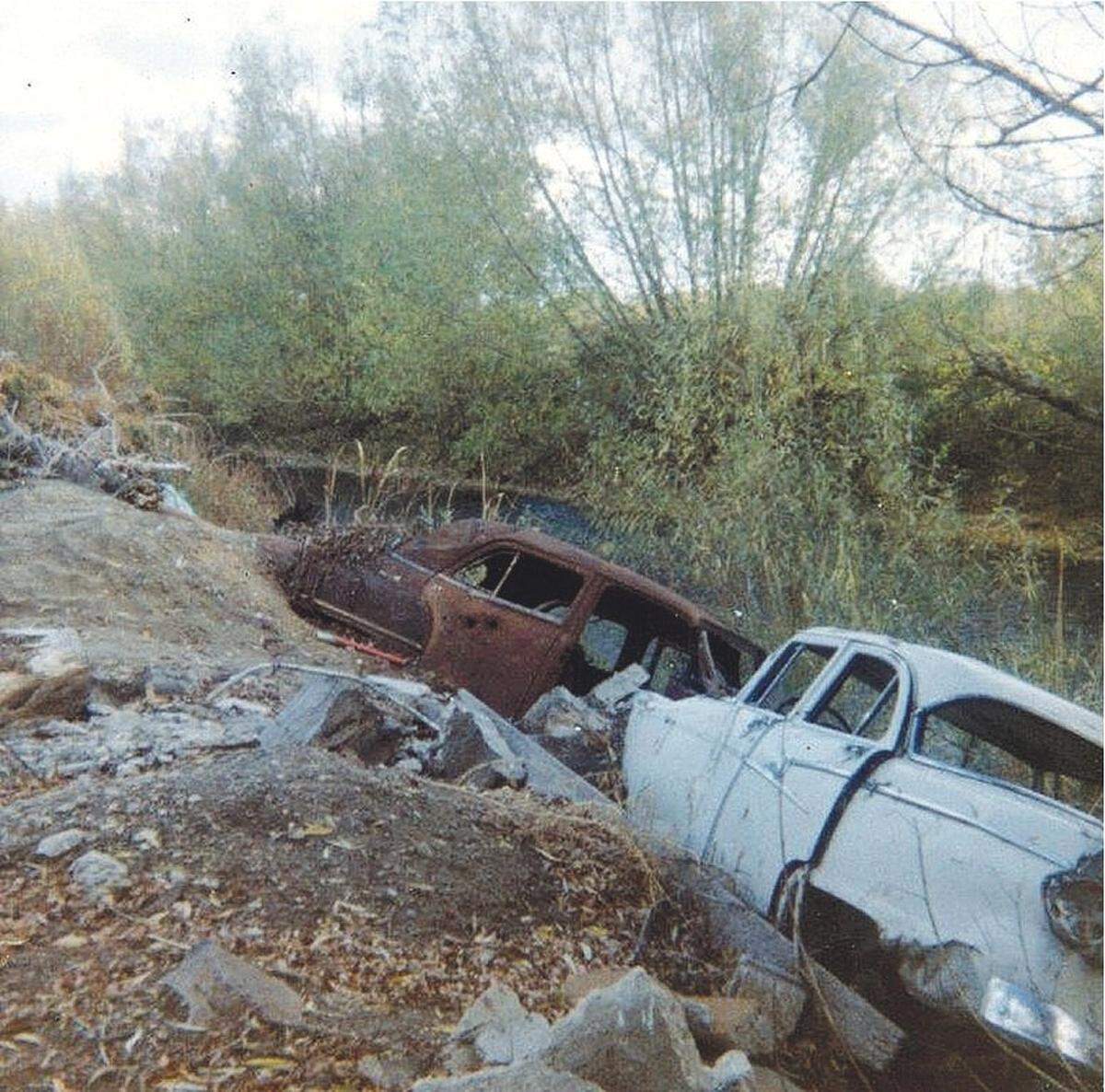 The river and its banks were a dump before they were a beloved public amenity. Some old car bodies were filled with rocks, and then covered with topsoil to create landfill. This photo was taken in the late 1960s or early 1970s.