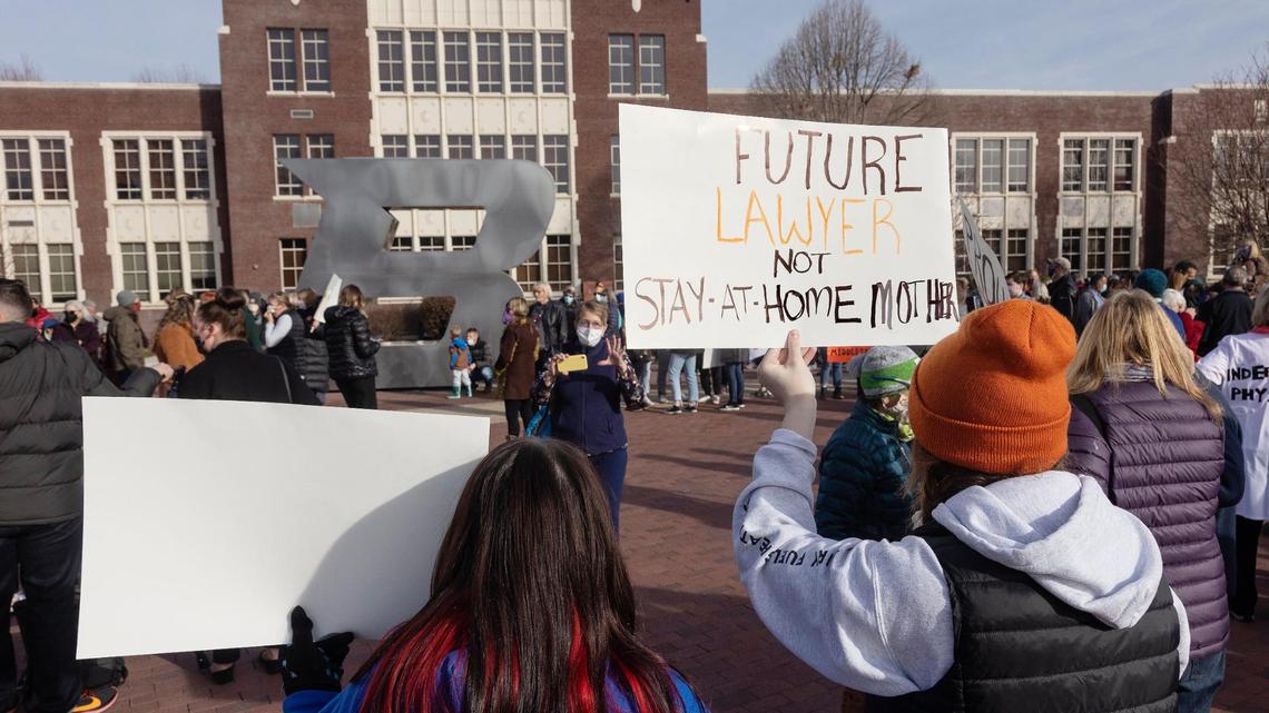 Avery Navest, 15, holds a sign reading “Future lawyer not stay-at-home mother” while attending a protest at Boise State University on Dec. 4, 2021 over remarks made by BSU political science professor Dr. Scott Yenor.