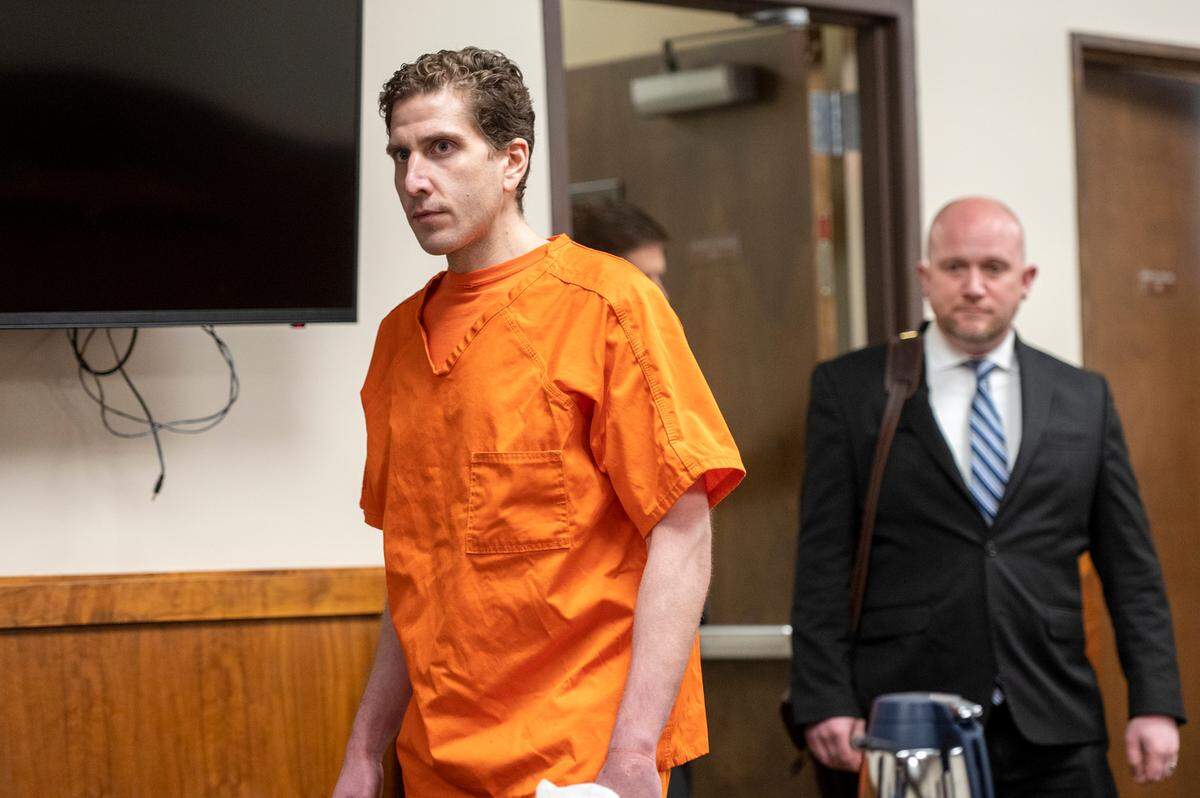 Trailed by defense attorney Jay Logsdon, right, Bryan Kohberger appeared for his arraignment in Latah County District Court in May 2023, in Moscow, Idaho.