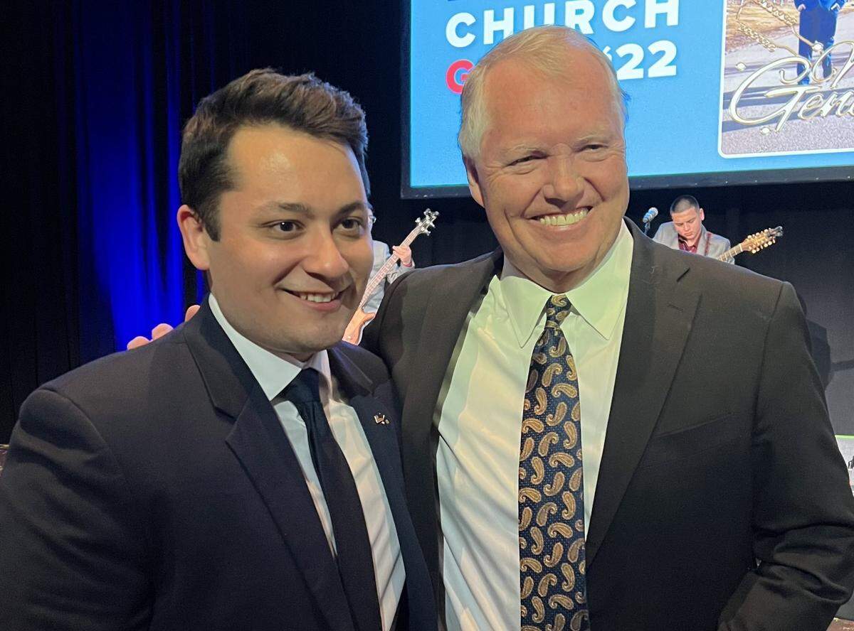 Outgoing Idaho Democratic Party chairman Fred Cornforth, right, pauses for a photo with Jesse Maldonado, who was then the vice chair of the party, at the Frank and Bethine Church Gala in Boise, Idaho, on March 12, 2022.