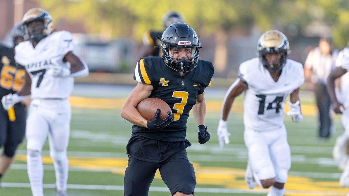 Bishop Kelly senior Cooper Cammann runs for a second-quarter touchdown Friday in a 49-14 win over Capital.