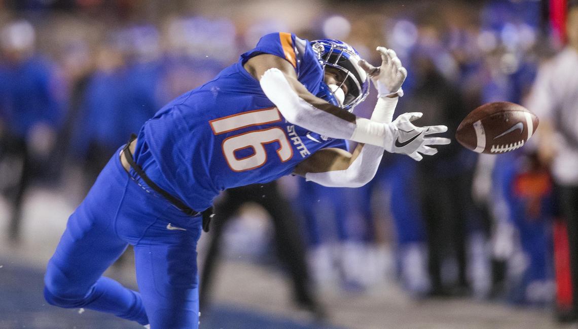 Boise State wide receiver John Hightower just misses a long throw along the sideline against Fresno State in the fourth quarter of the Mountain West championship game Saturday at Albertsons Stadium in Boise.