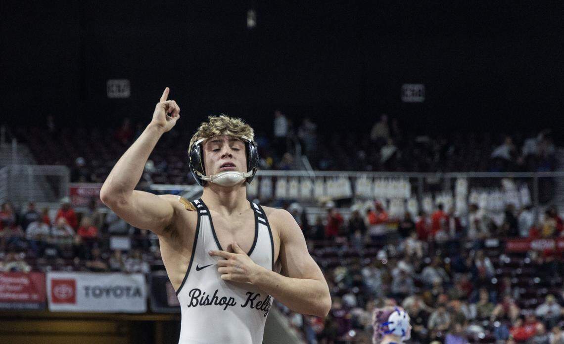 Bishop Kelly's Jake Mescher reacts to winning the 5A division first place match against Blackfoot's Brian Moreno at the Idaho state wrestling championships held at the Ford Idaho Center in Nampa, Saturday, Feb. 28, 2026.