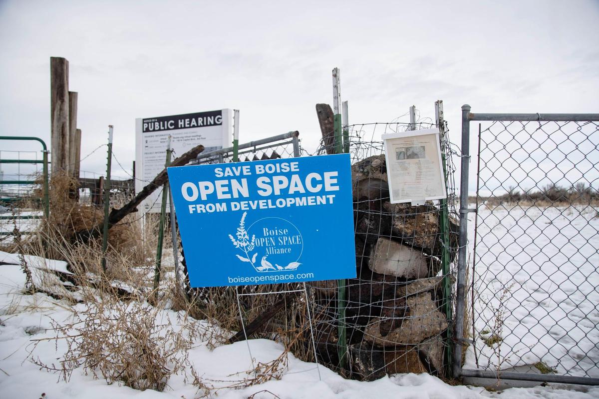Land between Umatilla Avenue and the Boise Airport, just past this sign, is being considered for rezoning for industrial use. It is currently zoned as permanent open land.
