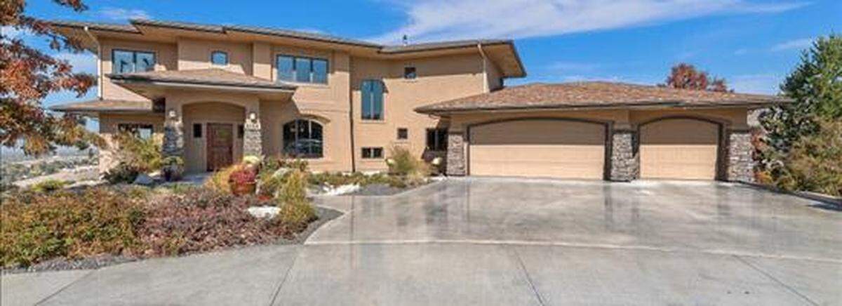 The house at 2154 E Solitude Court also includes a master suite with his and her closets and walk-in shower, an office facing the foothills and a walk-out basement.