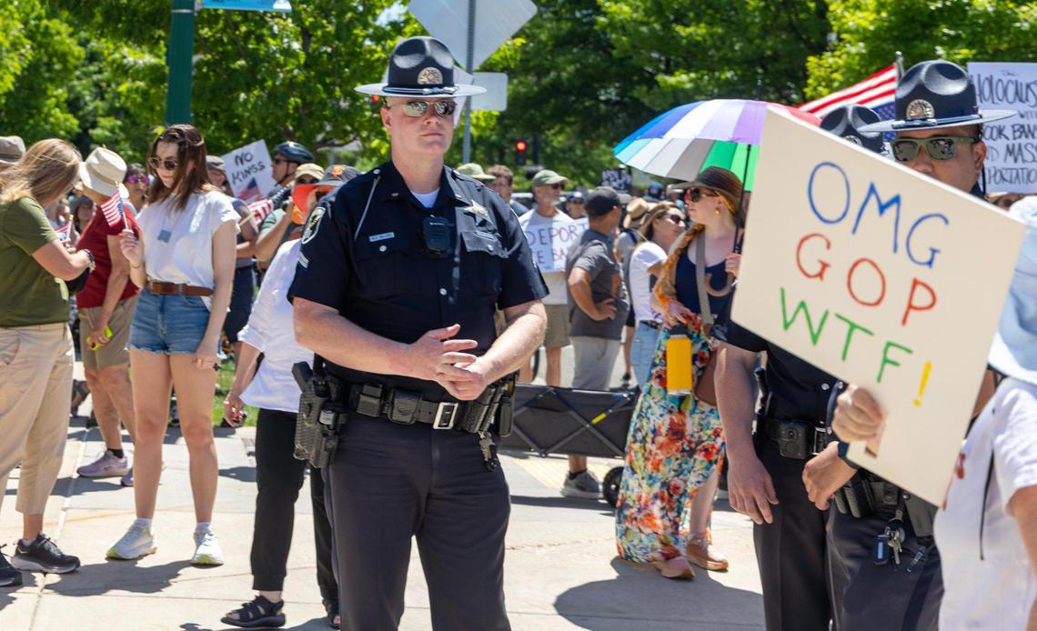 Idaho State Police make a presence as thousands of protesters gathered outside of the Idaho Capitol Building in Boise Saturday, June 14, 2025 as part of the national “No Kings” protests against President Donald Trump and his administration.