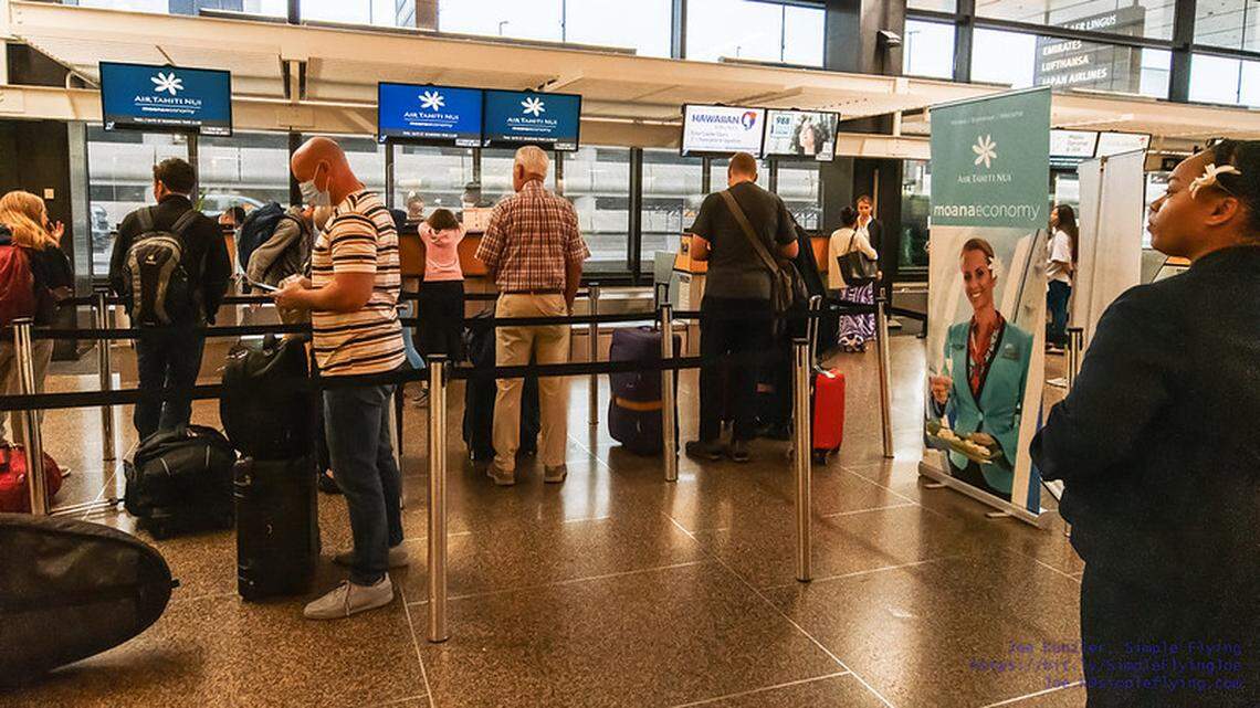 Passengers in line at Seattle-Tacoma International Airport.
