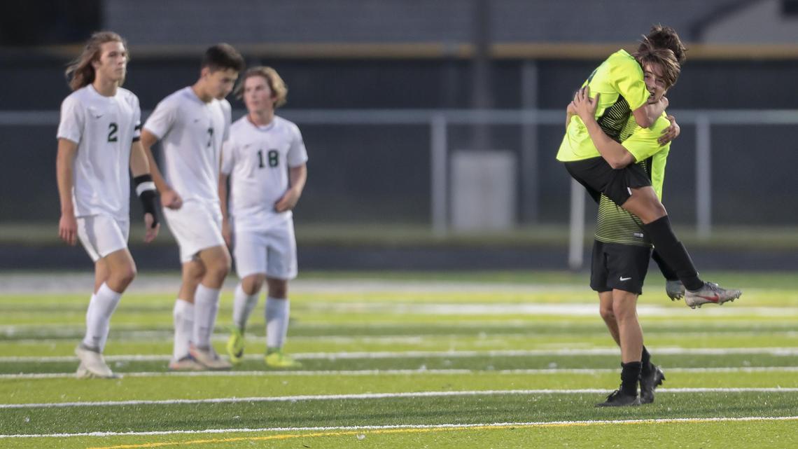 Borah sophomores Carlos Camacho and Cameron Vezzoso, right, celebrate a 1-0 win over Eagle in the 5A District Three boys soccer championship Wednesday, Oct. 16, 2019 at Rocky Mountain High School in Meridian.