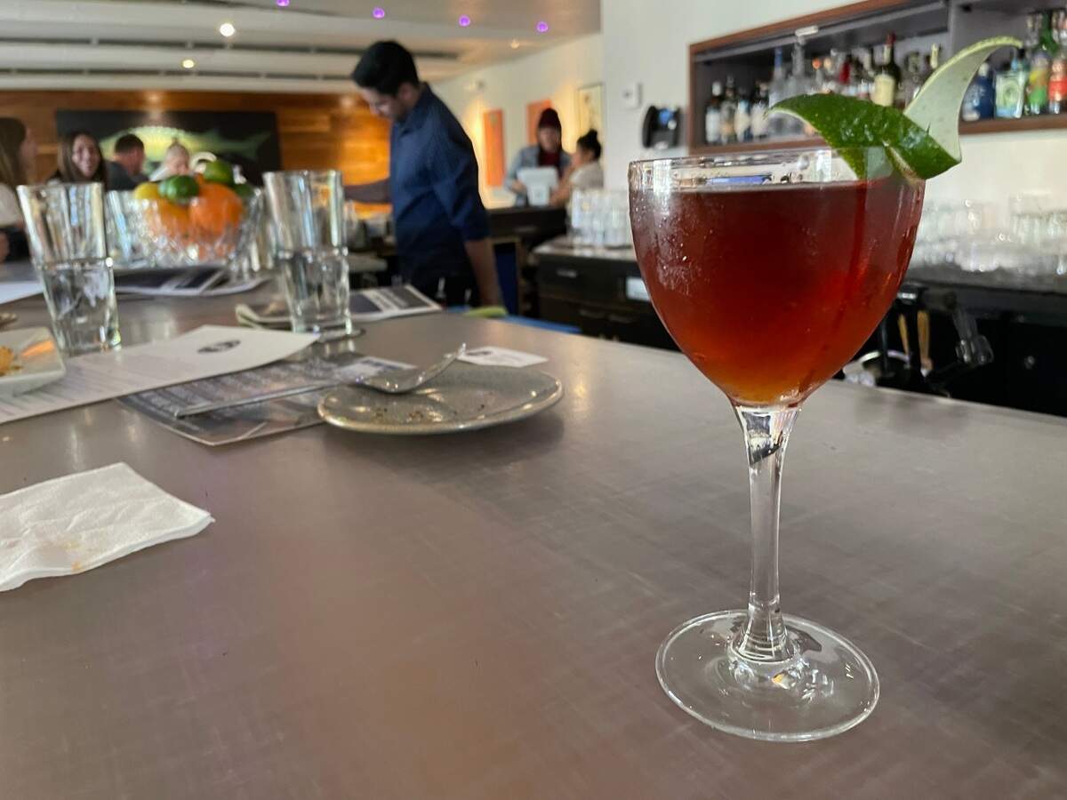 The specially created City of Trees cocktail at The Modern Bar: Chopin Potato Vodka, Zirbenz Stone Pine Liqueur of the Alps, Montelobos Mezcal, cinnamon syrup, Angostura bitters and black walnut bitters.