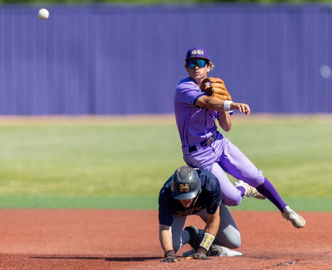 Rocky Mountain shortstop Jeff Thompson tries to turn a double play during the first round of last year’s state tournament.