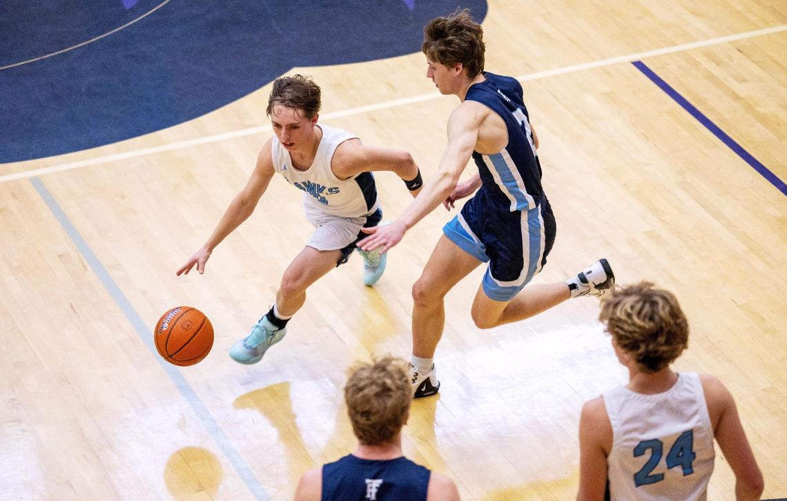 Skyview’s Kaden Salvadori dribbles to the basket against Twin Falls at the 2023 4A state tournament at Rocky Mountain High School.