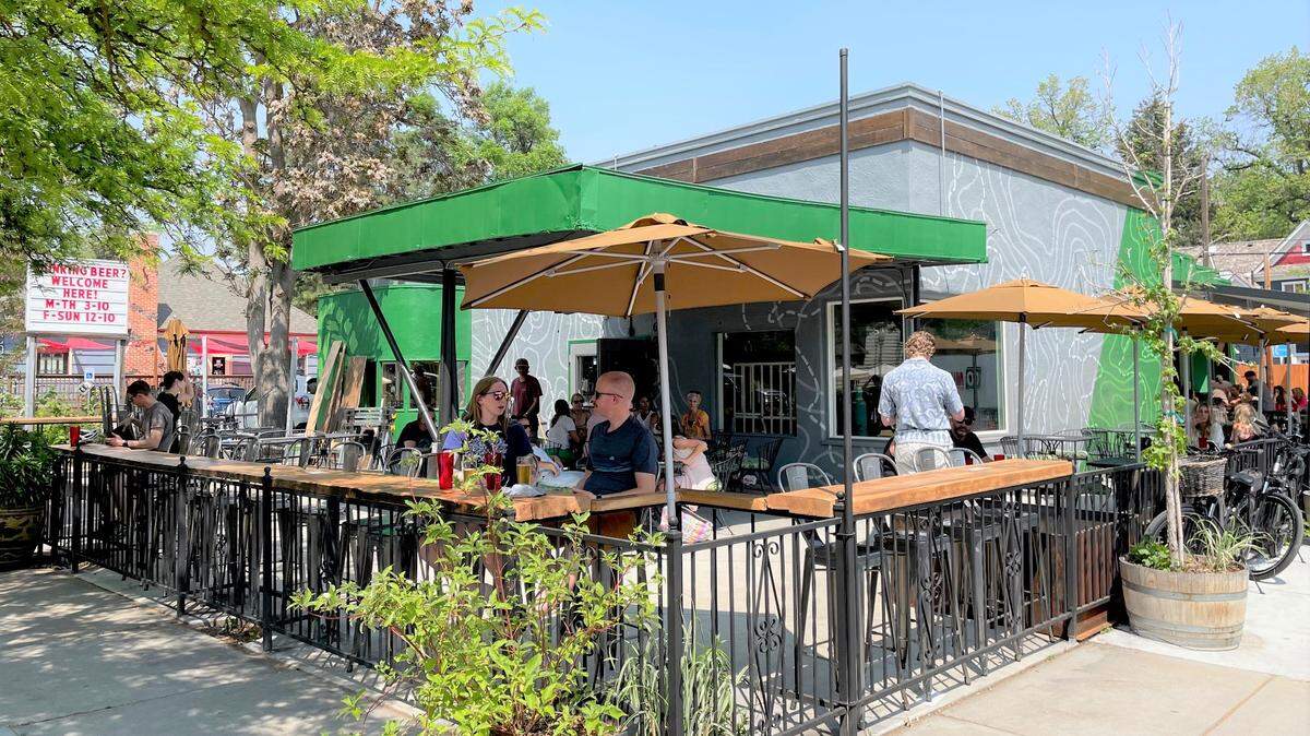 Patrons enjoy spring Boise weather Friday afternoon on the patio of Lost Grove Brewing in Hyde Park.