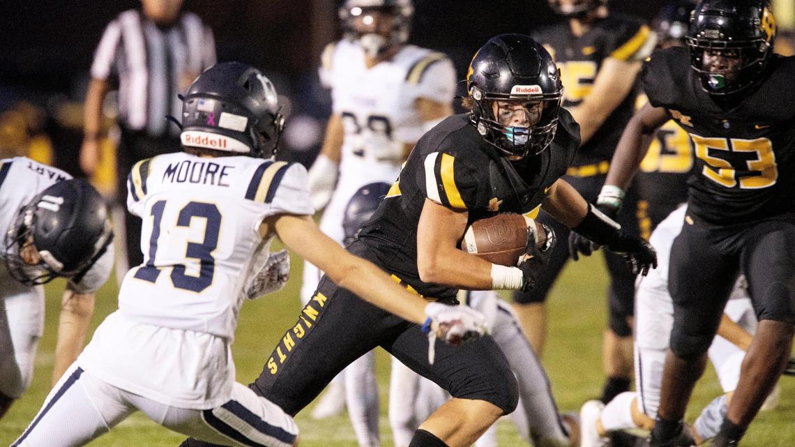 Bishop Kelly running back Seth Knothe breaks into the second level of the Middleton defense Friday at Bishop Kelly.
