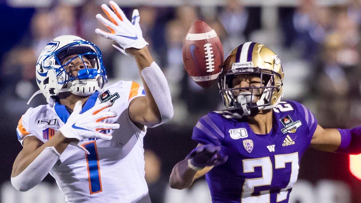 Boise State wide receiver Octavius Evans is unable to come up with a pass while defended by Washington defensive back Keith Taylor in the first half of the Las Vegas Bowl last year.