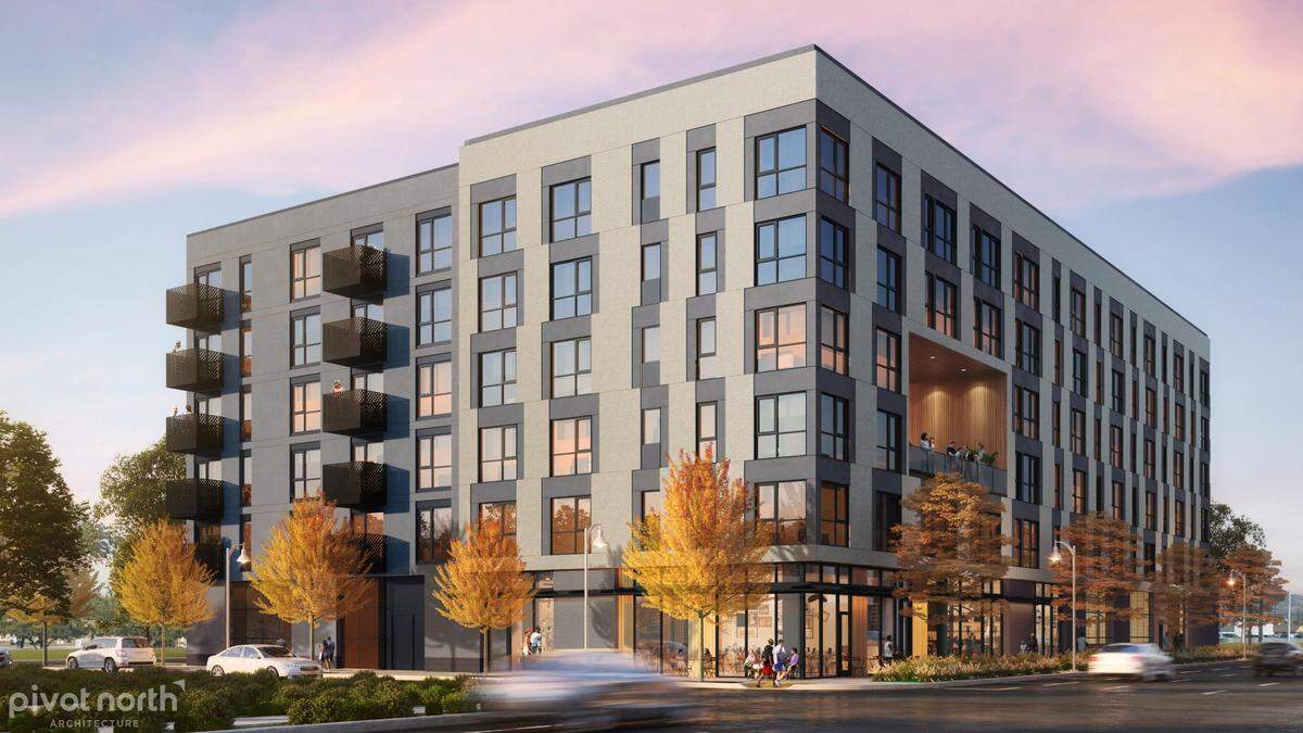 An architect’s rendering of the 88-apartment 24th and Fairview building proposed by deChase Miksis. Fairview Avenue is at lower right, with traffic eastbound toward downtown.