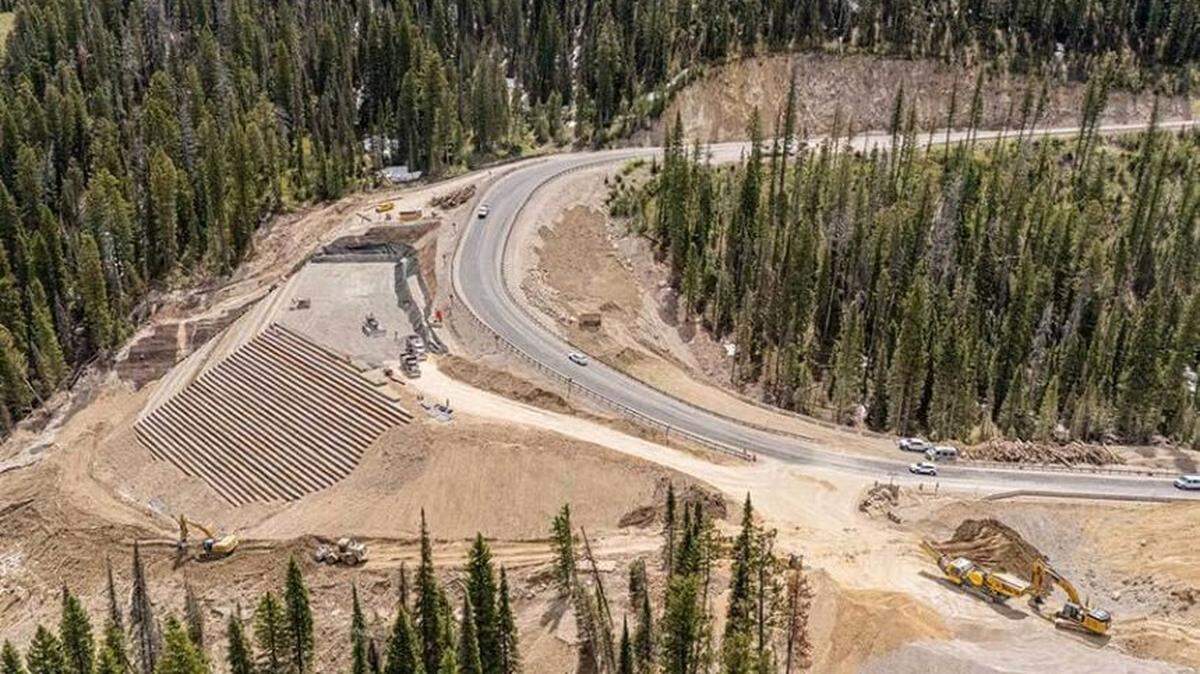 Crews are nearly finished rebuilding the section of highway that collapsed last year on Teton Pass. To guard against future landslides, the project has installed drainage, stitched the base together with micropiles and used lighter-weight material to complete the “Big Fill.”