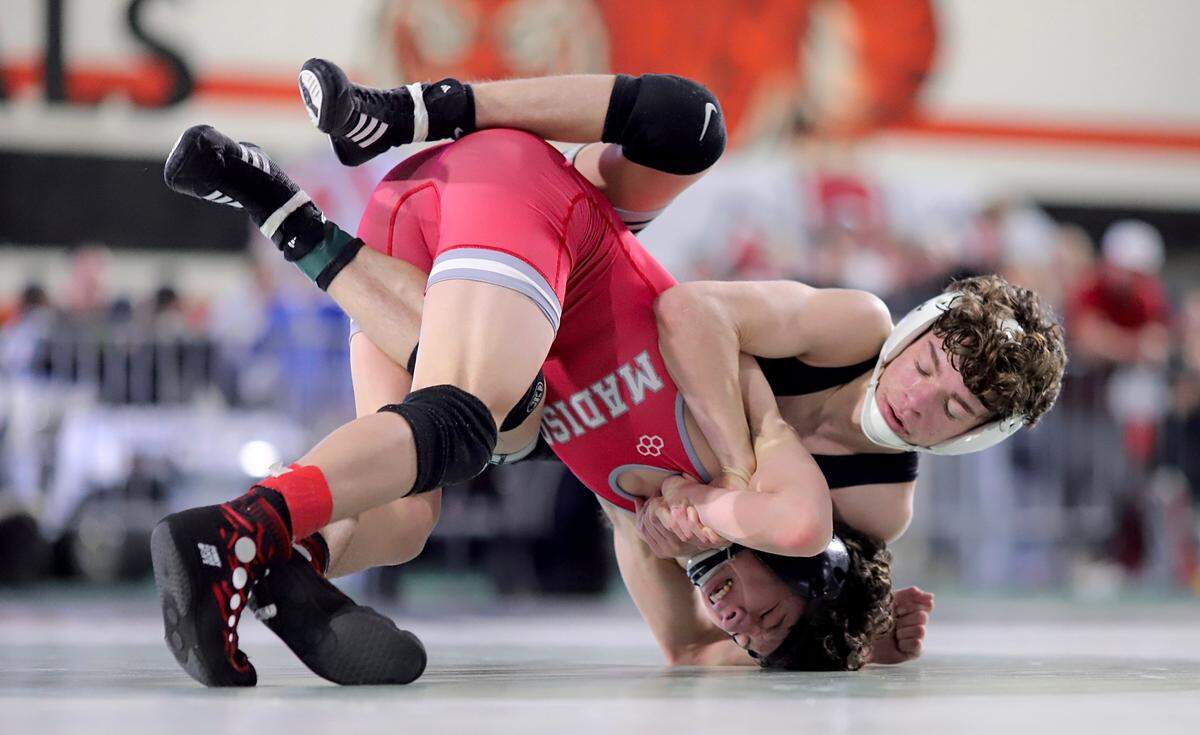 Nampa junior Ryan Hirchert, right, was voted to Co-Wrestler of the Year in the 6A Southern Idaho Conference this winter by the league’s coaches.