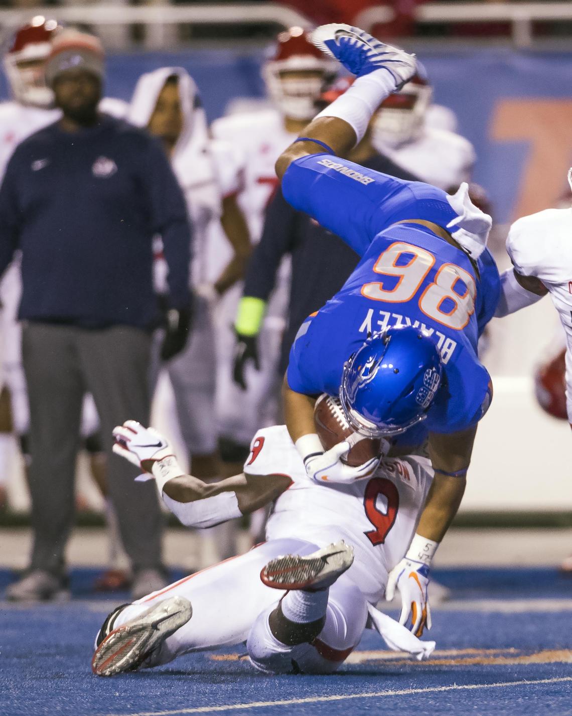 Fresno State linebacker Jeff Allison (9) upends Boise State tight end Chase Blakley (86) in the Bulldogs’ 24-17 loss to the Broncos Friday, Nov. 9, 2018 at Albertsons Stadium in Boise. Allison is closing in on the single-season Top 10 for tackles at Fresno State.