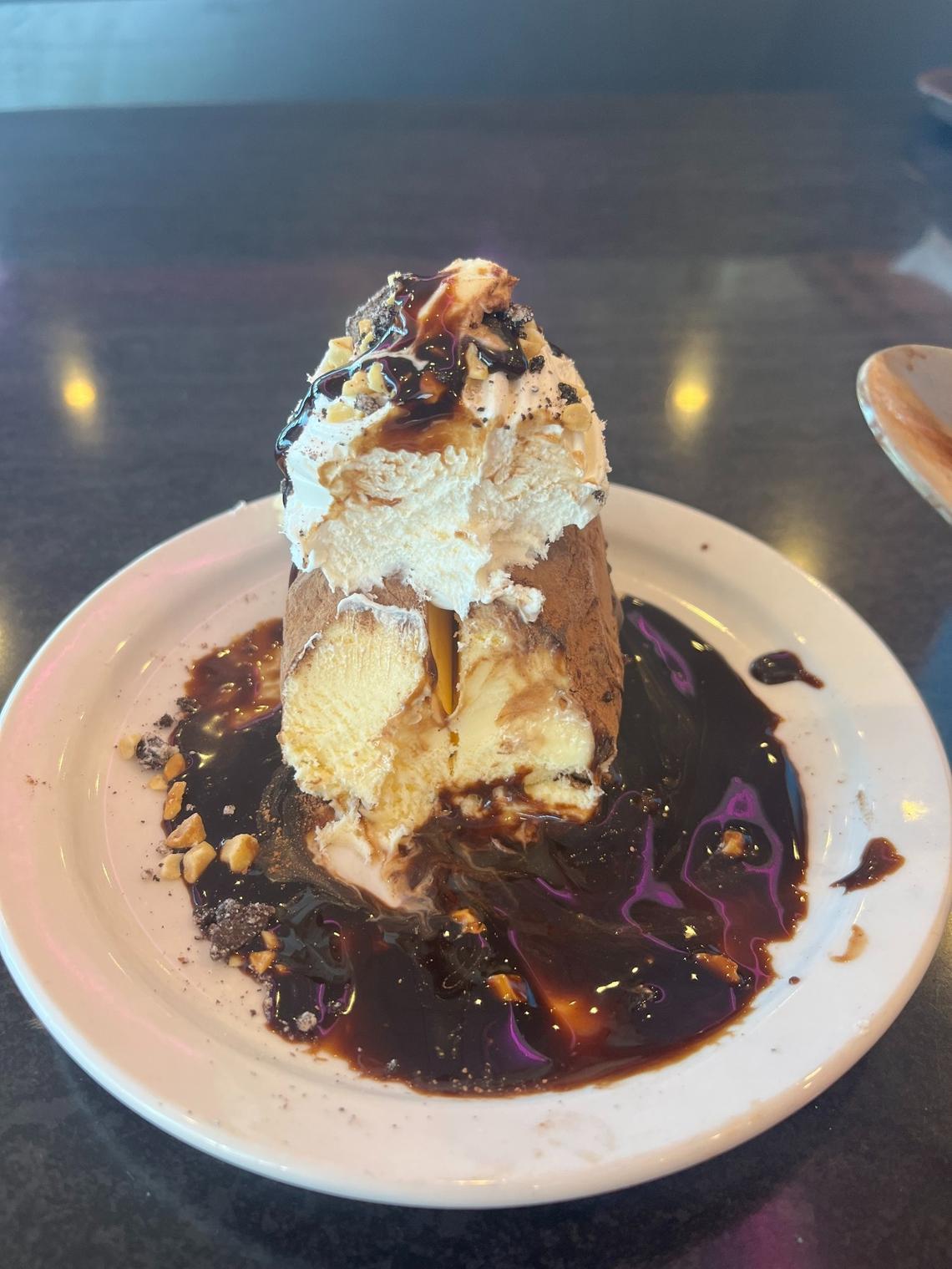 Westside Drive In’s potato ice cream is made of vanilla ice cream, cocoa powder, whipped cream, chocolate chunks, crushed nuts and chocolate syrup.